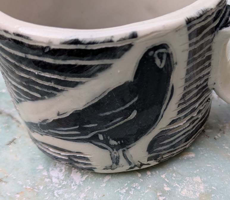 Sketchy crows mug, crow making eye contact