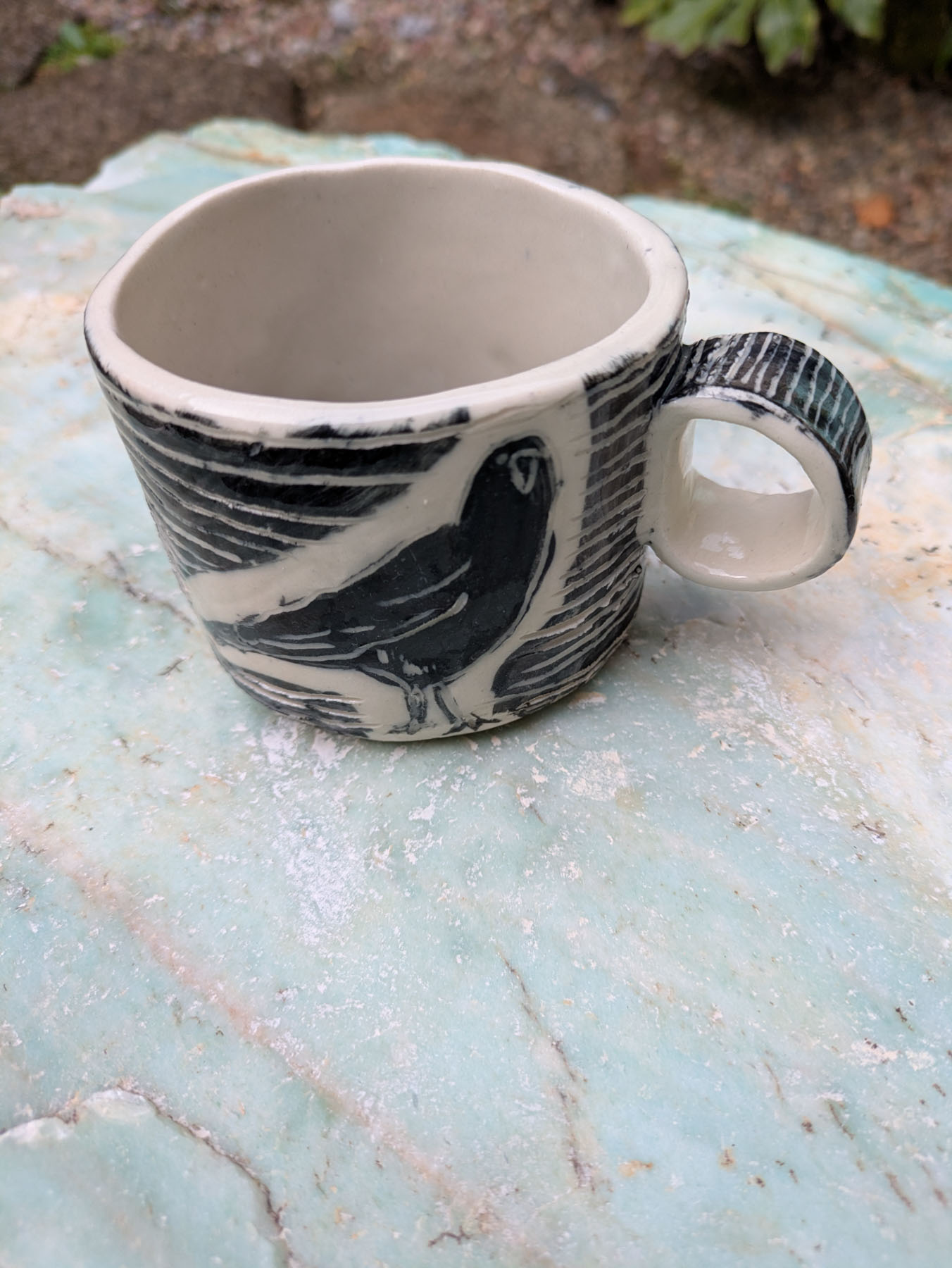 Sketchy crows mug, side view